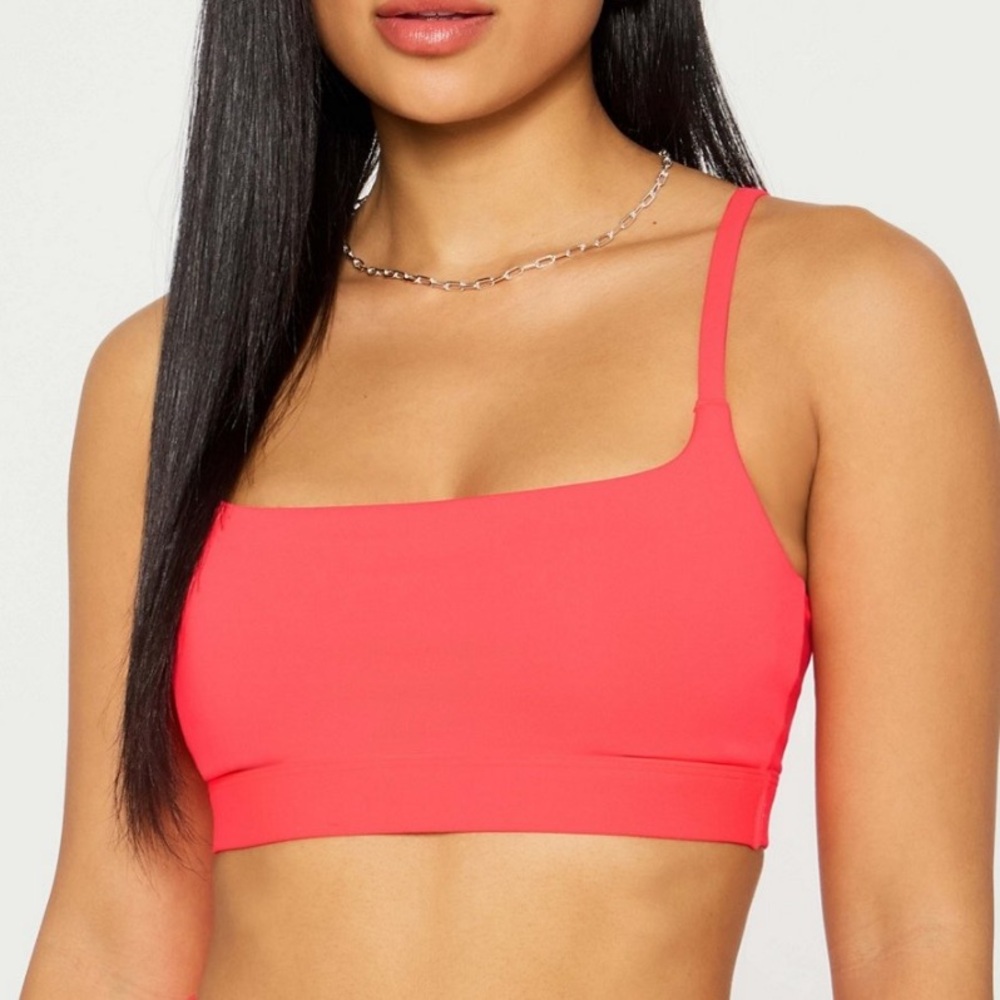 Fabletics Essential Low Impact Sports Bra in Neon Coral